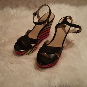 High wedge multi colored shoes.